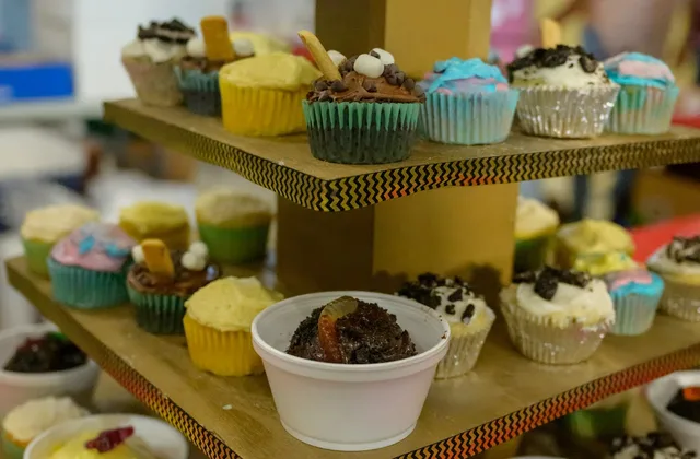 Cupcakes and baked goods on a display stand