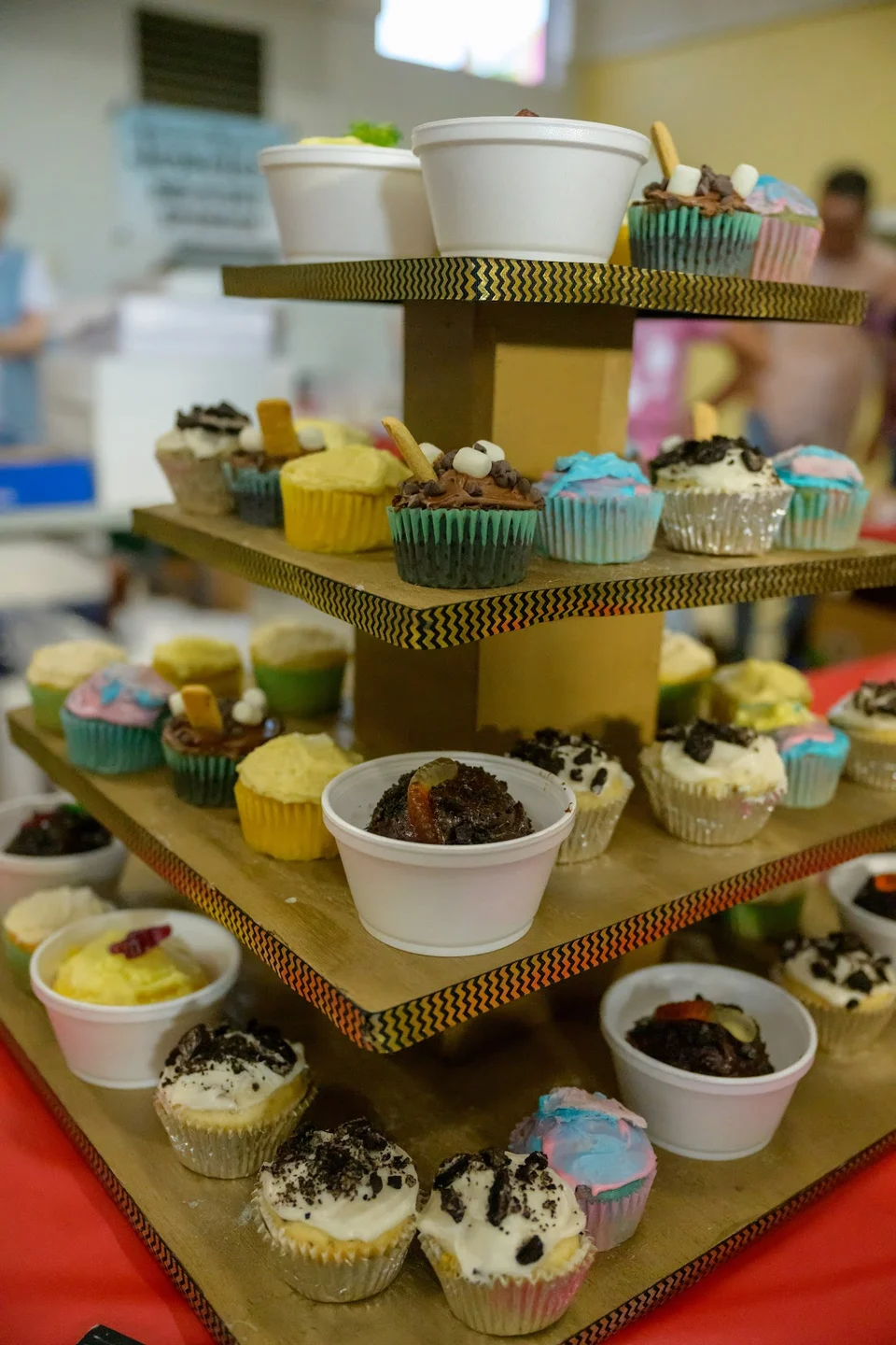 Cupcakes and baked goods on a display stand