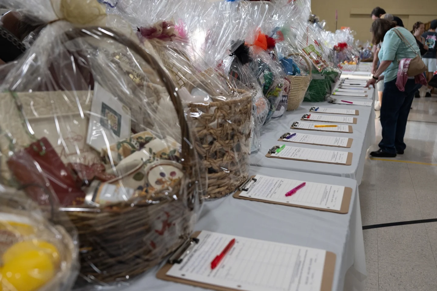 Gift baskets lined up for the festival basket auction