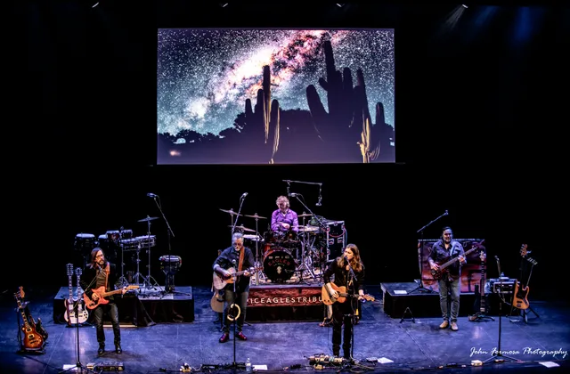 Epic Eagles band performing together on stage