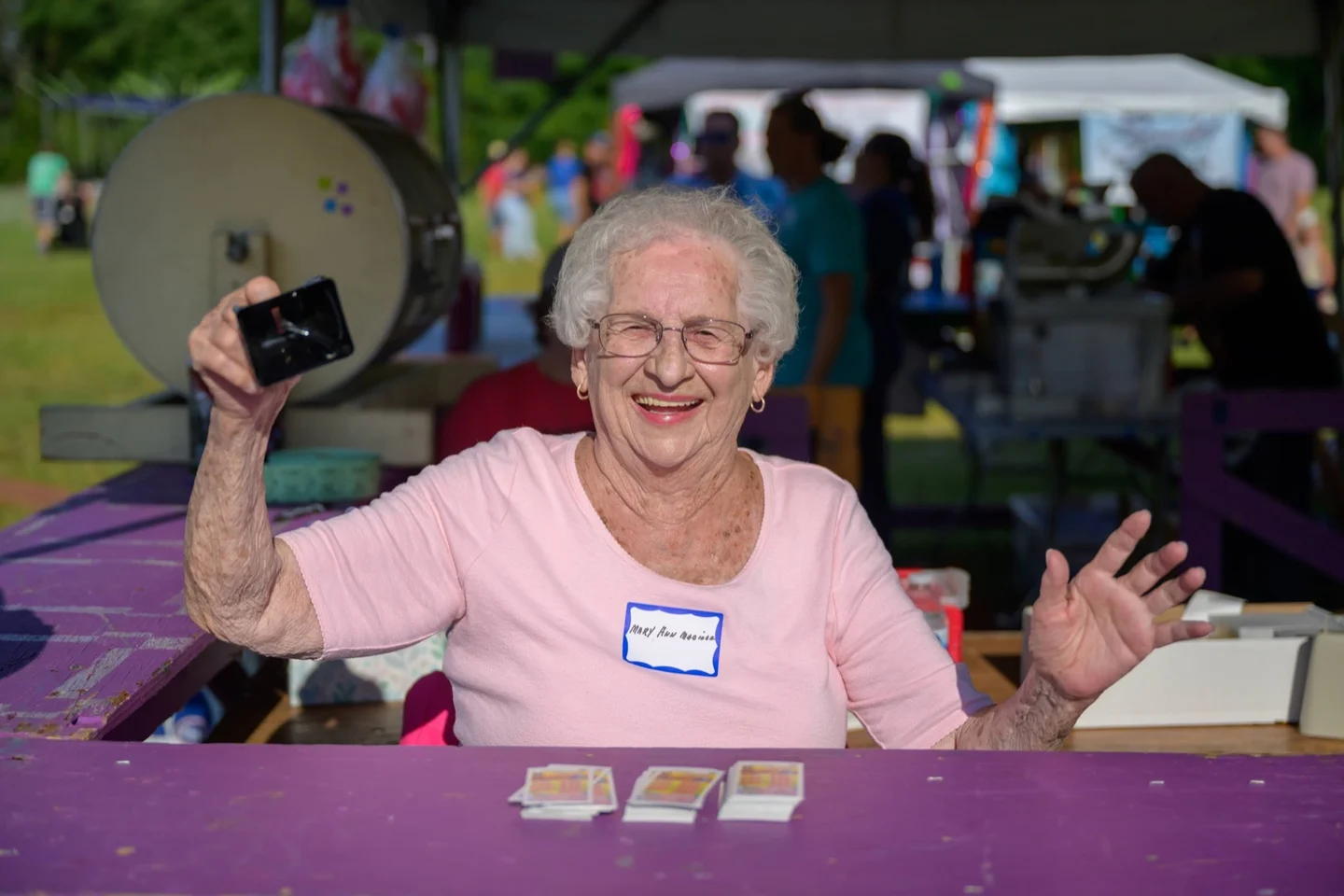 Volunteer selling instant bingo tear-off tickets